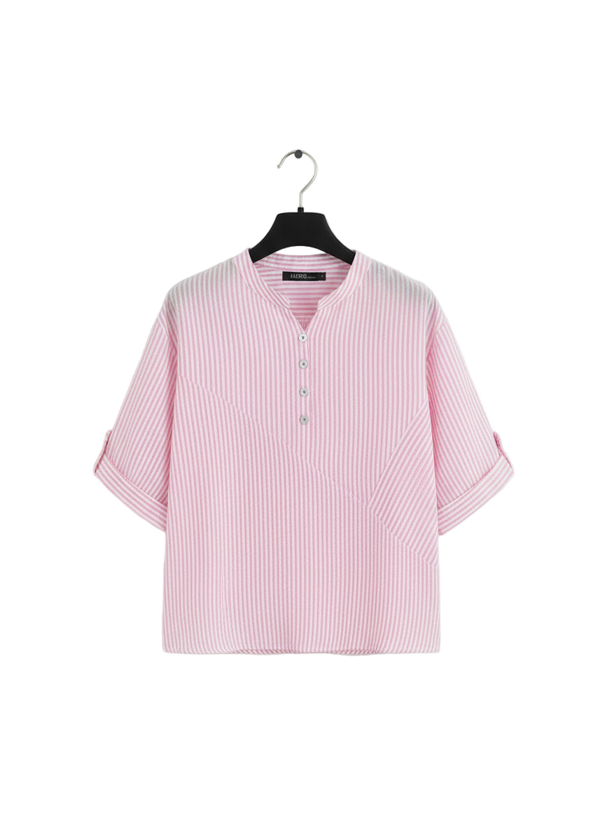 Pink checkered blouse on a hanger with a beige background