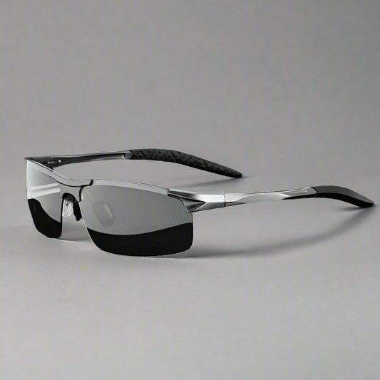 Sunglasses with photochromic properties, case, and box on a white background