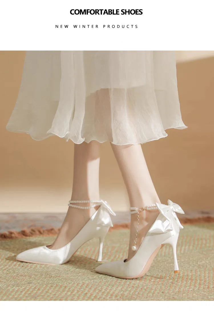 RBB Elegant White Stiletto Heels with Pearl Buckle & Satin Bow – Bridal & Party Pumps (Size 35–40)