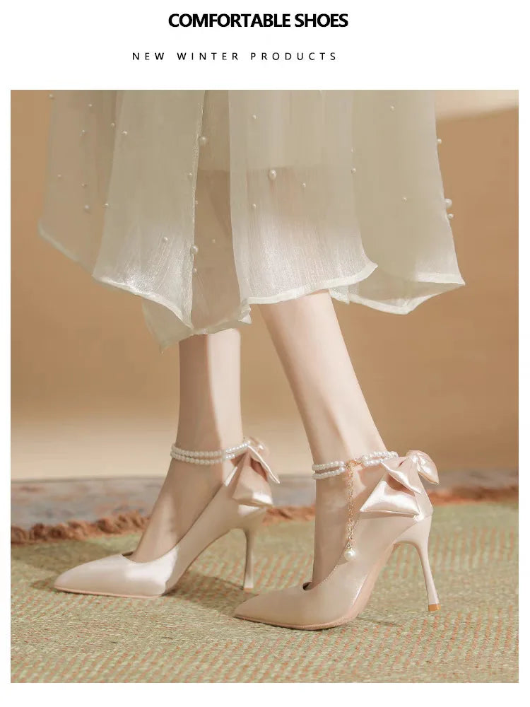 RBB Elegant White Stiletto Heels with Pearl Buckle & Satin Bow – Bridal & Party Pumps (Size 35–40)