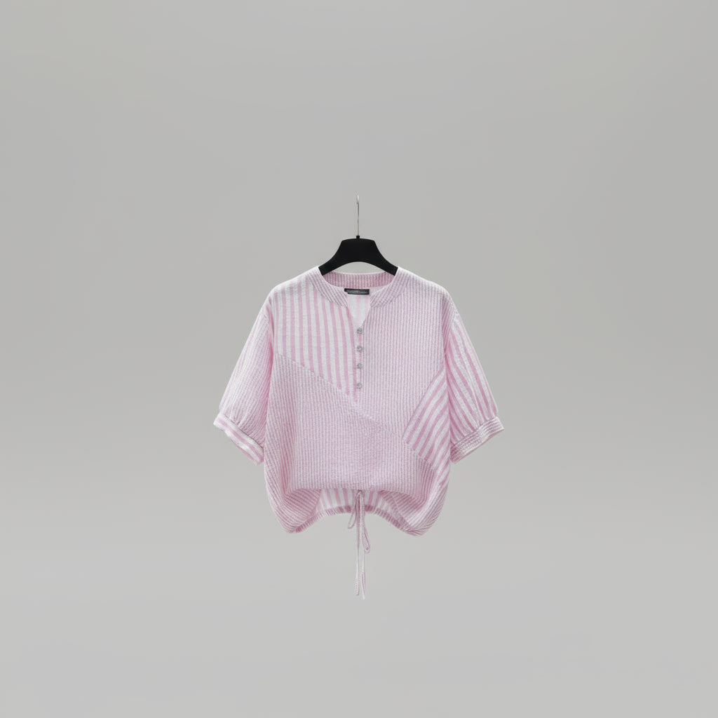 Pink striped shirt on a hanger with ZANZEA branding