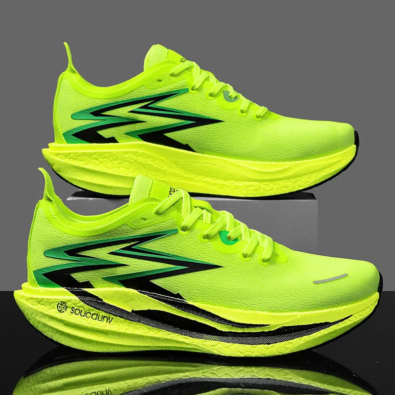 Bright yellow running shoes with black and green design on a reflective surface.