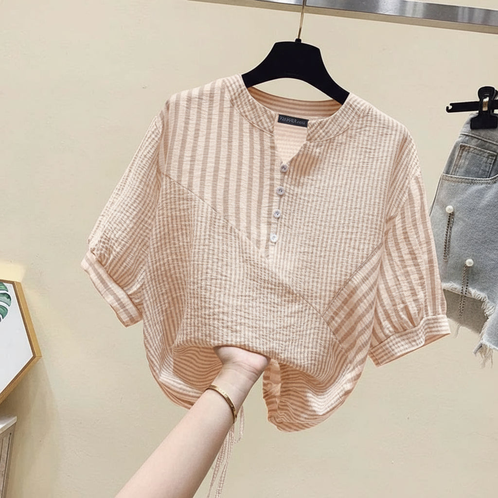 Pink plaid shirt on a hanger with ZANZEA branding